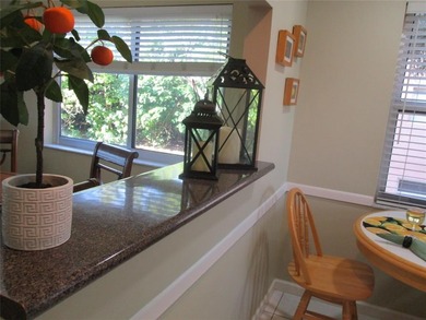 BEAUTIFUL, VERY SPACIOUS CORNER UNIT OFFERING ABUNDANT NATURAL on Sunrise Lakes Phase III in Florida - for sale on GolfHomes.com, golf home, golf lot