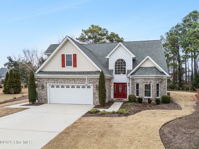 You don't buy a home like this because you need it. You buy it on North Shore Country Club in North Carolina - for sale on GolfHomes.com, golf home, golf lot