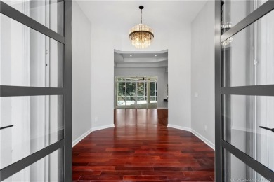 Exceptional custom home, perfectly set within Stuart's on Willoughby Golf Club in Florida - for sale on GolfHomes.com, golf home, golf lot