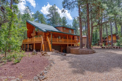 Custom FULL LOG cabin ON TWO LOTS . This Pinetop Lakes Country on Pinetop Lakes Golf and Country Club in Arizona - for sale on GolfHomes.com, golf home, golf lot