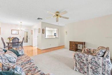 Welcome to effortless Florida living in this furnished on Highland Lakes Executive Golf Course in Florida - for sale on GolfHomes.com, golf home, golf lot