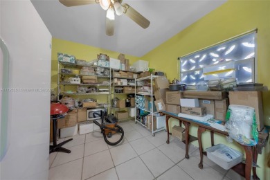Located in the guard-gated community of Normandy Shores, this on Normandy Shores Golf Course in Florida - for sale on GolfHomes.com, golf home, golf lot