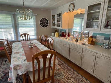 Experience the exceptional amenities offered by Palm Hill on Palm Hill Golf Club in Florida - for sale on GolfHomes.com, golf home, golf lot
