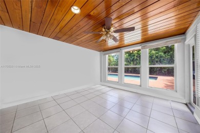 Located in the guard-gated community of Normandy Shores, this on Normandy Shores Golf Course in Florida - for sale on GolfHomes.com, golf home, golf lot