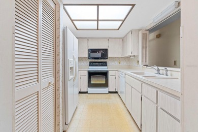 Welcome to effortless Florida living in this furnished on Highland Lakes Executive Golf Course in Florida - for sale on GolfHomes.com, golf home, golf lot