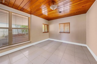Located in the guard-gated community of Normandy Shores, this on Normandy Shores Golf Course in Florida - for sale on GolfHomes.com, golf home, golf lot
