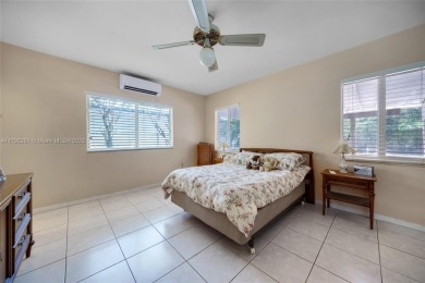 Located in the guard-gated community of Normandy Shores, this on Normandy Shores Golf Course in Florida - for sale on GolfHomes.com, golf home, golf lot