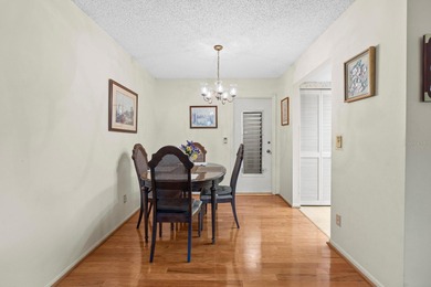 Welcome to effortless Florida living in this furnished on Highland Lakes Executive Golf Course in Florida - for sale on GolfHomes.com, golf home, golf lot