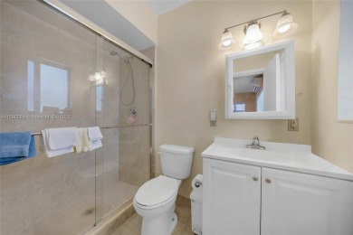 Located in the guard-gated community of Normandy Shores, this on Normandy Shores Golf Course in Florida - for sale on GolfHomes.com, golf home, golf lot