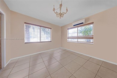Located in the guard-gated community of Normandy Shores, this on Normandy Shores Golf Course in Florida - for sale on GolfHomes.com, golf home, golf lot