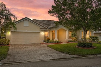 Step inside and fall in love with the view - a sparkling pool on Eagle Marsh Golf Club in Florida - for sale on GolfHomes.com, golf home, golf lot