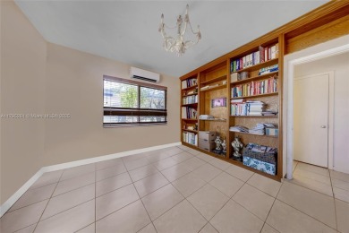 Located in the guard-gated community of Normandy Shores, this on Normandy Shores Golf Course in Florida - for sale on GolfHomes.com, golf home, golf lot