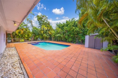 Located in the guard-gated community of Normandy Shores, this on Normandy Shores Golf Course in Florida - for sale on GolfHomes.com, golf home, golf lot
