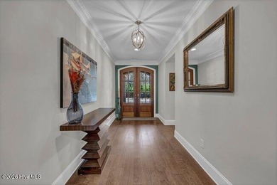 The Pawley, all brick built by Logan Homes in 2020 is nestled in on Cape Fear National At Brunswick Forest in North Carolina - for sale on GolfHomes.com, golf home, golf lot