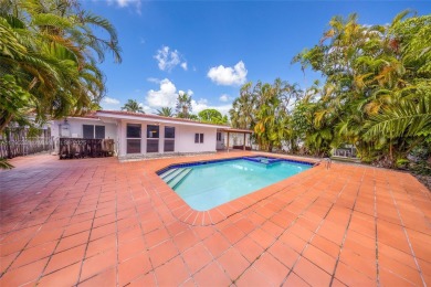 Located in the guard-gated community of Normandy Shores, this on Normandy Shores Golf Course in Florida - for sale on GolfHomes.com, golf home, golf lot
