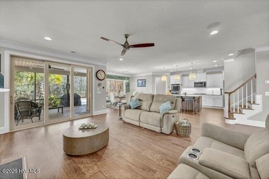 Experience luxury in this exquisite 3-bedroom, 3-bath all-brick on Cape Fear National At Brunswick Forest in North Carolina - for sale on GolfHomes.com, golf home, golf lot