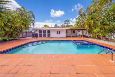 Located in the guard-gated community of Normandy Shores, this on Normandy Shores Golf Course in Florida - for sale on GolfHomes.com, golf home, golf lot