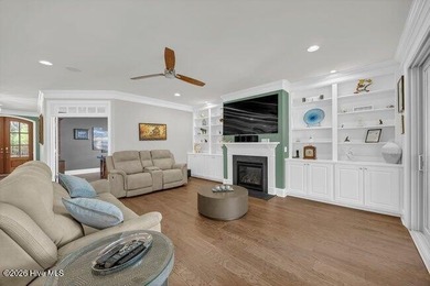 Experience luxury in this exquisite 3-bedroom, 3-bath all-brick on Cape Fear National At Brunswick Forest in North Carolina - for sale on GolfHomes.com, golf home, golf lot