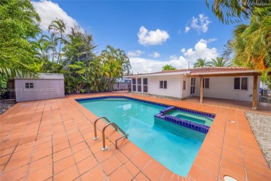 Located in the guard-gated community of Normandy Shores, this on Normandy Shores Golf Course in Florida - for sale on GolfHomes.com, golf home, golf lot