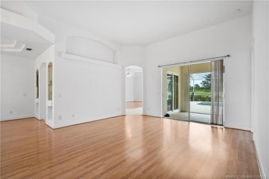 Step inside and fall in love with the view - a sparkling pool on Eagle Marsh Golf Club in Florida - for sale on GolfHomes.com, golf home, golf lot