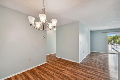 Spacious END UNIT with 3 bedrooms and 2 full bathrooms WITH A on Hunters Green Country Club in Florida - for sale on GolfHomes.com, golf home, golf lot