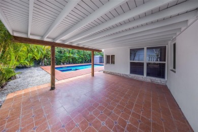 Located in the guard-gated community of Normandy Shores, this on Normandy Shores Golf Course in Florida - for sale on GolfHomes.com, golf home, golf lot