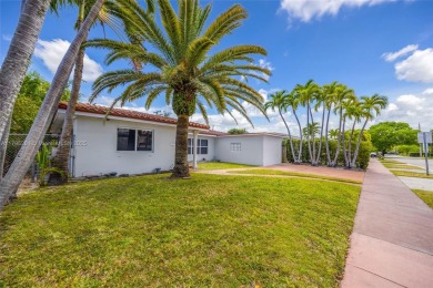 Located in the guard-gated community of Normandy Shores, this on Normandy Shores Golf Course in Florida - for sale on GolfHomes.com, golf home, golf lot