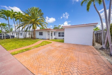 Located in the guard-gated community of Normandy Shores, this on Normandy Shores Golf Course in Florida - for sale on GolfHomes.com, golf home, golf lot