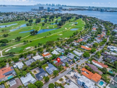 Located in the guard-gated community of Normandy Shores, this on Normandy Shores Golf Course in Florida - for sale on GolfHomes.com, golf home, golf lot