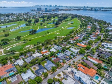 Located in the guard-gated community of Normandy Shores, this on Normandy Shores Golf Course in Florida - for sale on GolfHomes.com, golf home, golf lot