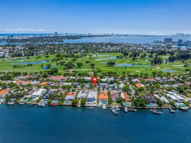 Located in the guard-gated community of Normandy Shores, this on Normandy Shores Golf Course in Florida - for sale on GolfHomes.com, golf home, golf lot