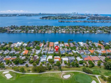 Located in the guard-gated community of Normandy Shores, this on Normandy Shores Golf Course in Florida - for sale on GolfHomes.com, golf home, golf lot
