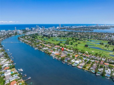 Located in the guard-gated community of Normandy Shores, this on Normandy Shores Golf Course in Florida - for sale on GolfHomes.com, golf home, golf lot