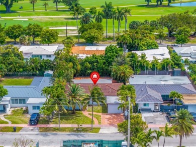 Located in the guard-gated community of Normandy Shores, this on Normandy Shores Golf Course in Florida - for sale on GolfHomes.com, golf home, golf lot