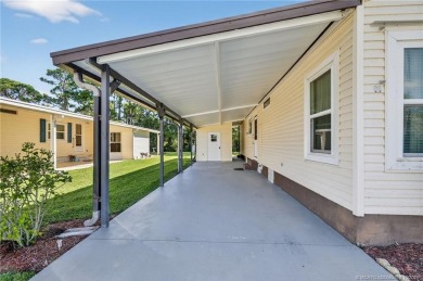 LAND OWNED-NO LAND LEASE! Welcome to 2629 Caper Court in the on Spanish Lakes Golf Village in Florida - for sale on GolfHomes.com, golf home, golf lot