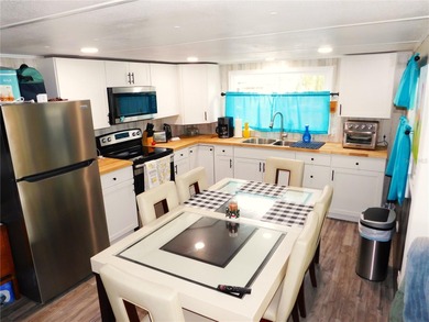 This inviting single-wide home in Betmar Acres, a friendly 55+ on Betmar Acres Golf Club in Florida - for sale on GolfHomes.com, golf home, golf lot