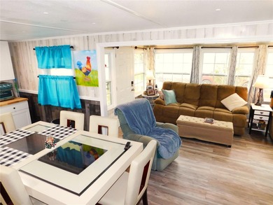 This inviting single-wide home in Betmar Acres, a friendly 55+ on Betmar Acres Golf Club in Florida - for sale on GolfHomes.com, golf home, golf lot