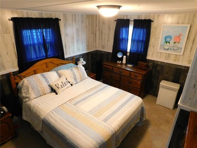 This inviting single-wide home in Betmar Acres, a friendly 55+ on Betmar Acres Golf Club in Florida - for sale on GolfHomes.com, golf home, golf lot