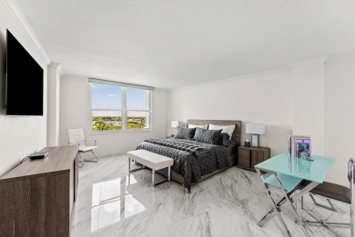 Experience coastal living at its finest in this fully updated on Palm Beach Par-3 Golf Course in Florida - for sale on GolfHomes.com, golf home, golf lot