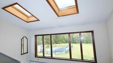 This sprawling home, tucked away down a quiet country road, is on Hidden Acres Golf Course in New Jersey - for sale on GolfHomes.com, golf home, golf lot