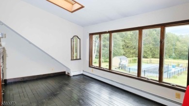 This sprawling home, tucked away down a quiet country road, is on Hidden Acres Golf Course in New Jersey - for sale on GolfHomes.com, golf home, golf lot