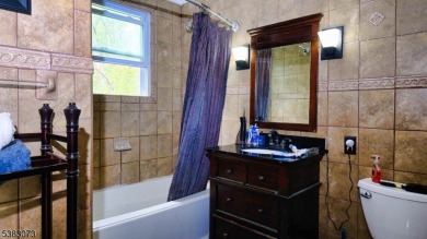 This sprawling home, tucked away down a quiet country road, is on Hidden Acres Golf Course in New Jersey - for sale on GolfHomes.com, golf home, golf lot