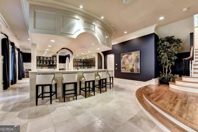 Nestled within the prestigious, gated community of Country Club on Country Club of the South in Georgia - for sale on GolfHomes.com, golf home, golf lot
