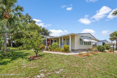 Beautiful updated manufactured home in Barefoot Bay. New roof in on Barefoot Bay Golf Course in Florida - for sale on GolfHomes.com, golf home, golf lot