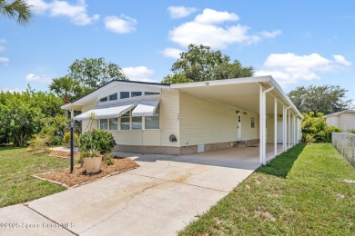 Beautiful updated manufactured home in Barefoot Bay. New roof in on Barefoot Bay Golf Course in Florida - for sale on GolfHomes.com, golf home, golf lot