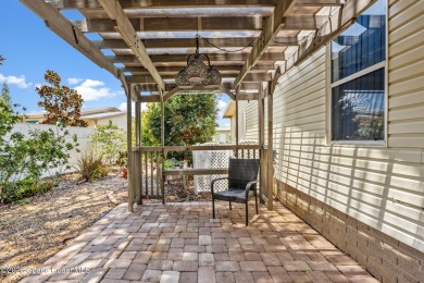 Beautiful updated manufactured home in Barefoot Bay. New roof in on Barefoot Bay Golf Course in Florida - for sale on GolfHomes.com, golf home, golf lot