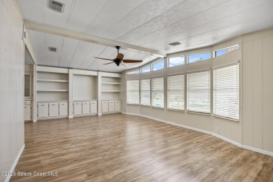 Beautiful updated manufactured home in Barefoot Bay. New roof in on Barefoot Bay Golf Course in Florida - for sale on GolfHomes.com, golf home, golf lot