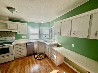 Home is located in Water Oak Country Club Estates in Lady Lake on Water Oak Country Club Estates in Florida - for sale on GolfHomes.com, golf home, golf lot