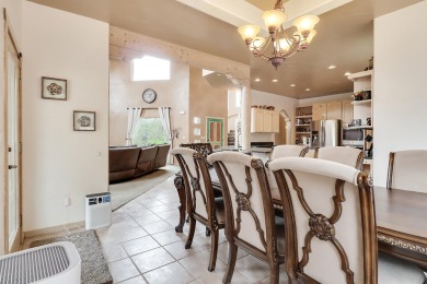 This custom Leo Husky home is a beautiful combination of nature on Paa-Ko Ridge Golf Club  in New Mexico - for sale on GolfHomes.com, golf home, golf lot