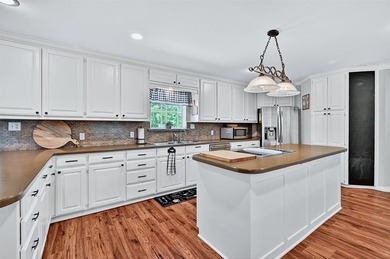 1246 Kiowa Drive West sits on a spacious double lot in the gated on Lake Kiowa Golf Course in Texas - for sale on GolfHomes.com, golf home, golf lot